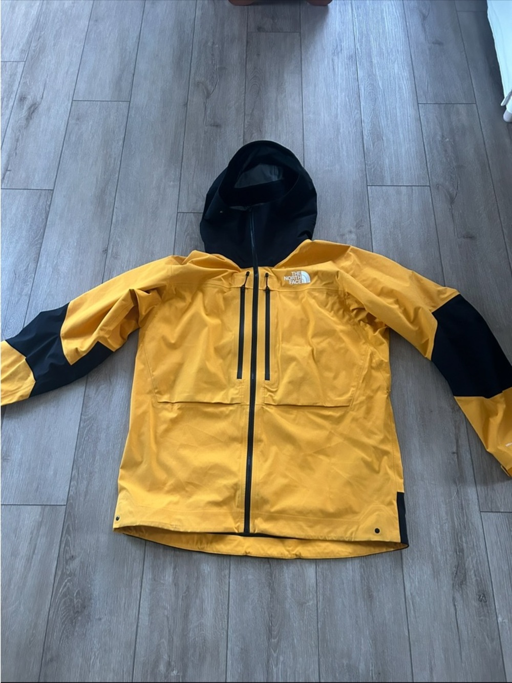 The North Face Yellow and Black Hooded Shell Jacket